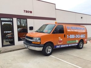 Water Damage Restoration Van Ready At Job Site